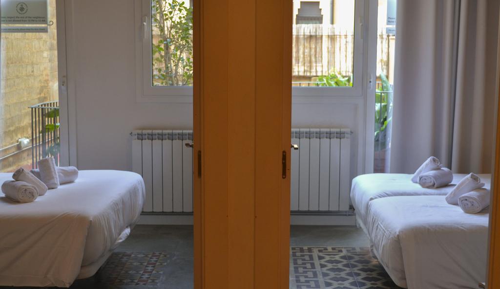 Happy People Plaza España Apartments Barcelona Habitación foto