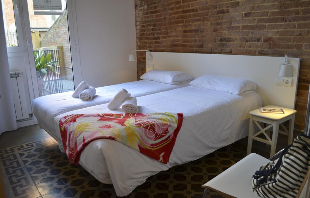 Happy People Plaza España Apartments Barcelona Habitación foto
